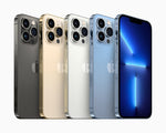An array of iPhone 13 Pro Max smartphones in various colors including gold, silver, gray, and blue.
