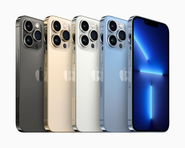 An array of iPhone 13 Pro Max smartphones in various colors including gold, silver, gray, and blue.