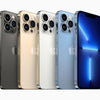 An array of iPhone 13 Pro Max smartphones in various colors including gold, silver, gray, and blue.