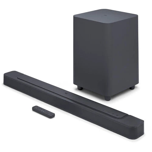 A black JBL Bar 500 590W 5.1-Channel Dolby Atmos Soundbar System with a wireless subwoofer, remote control, and various cables.