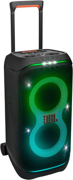 A portable JBL PartyBox Stage 320 speaker with illuminated light effects, featuring a black casing, wheels, and a telescopic handle.