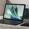 A Hotwav Pad 13 128GB tablet shown with a black keyboard case, standing on a stone pedestal. In the background, three teal-colored tablet devices are displayed on a small stand, alongside a black cloth and a stylus.