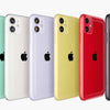 A lineup of Apple iPhone 11 smartphones in various colors including green, white, yellow, red, and black.