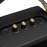 ​Marshall Tufton portable speaker with a rugged build, textured black finish, and gold-tone control knobs on the top panel.