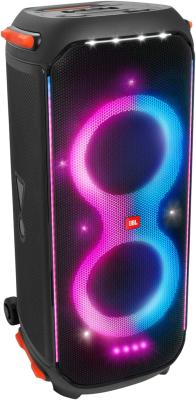 A tall, vertical, portable JBL PartyBox 710 speaker with colorful illuminated light patterns on the front. The speaker appears to be black with a handle on top and robust wheels at the bottom for mobility.