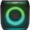 JBL speaker with green lighting on a black background
