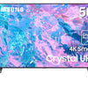 A 50 inch Samsung Crystal UHD 4K Smart TV displaying a colorful abstract image on the screen, with the model number and brand logo at the top.