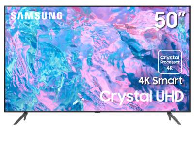 A 50 inch Samsung Crystal UHD 4K Smart TV displaying a colorful abstract image on the screen, with the model number and brand logo at the top.